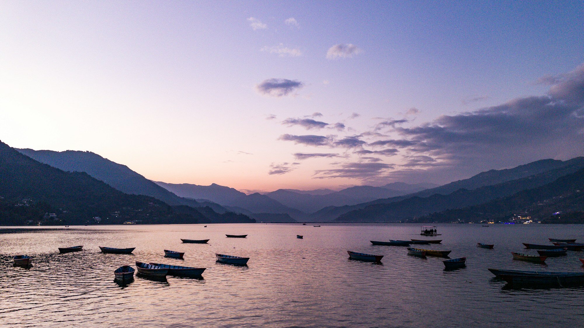 Boats on Phewa Lake in Pokhara, Nepal